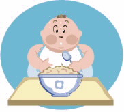 bebé frente a un plato de papilla
